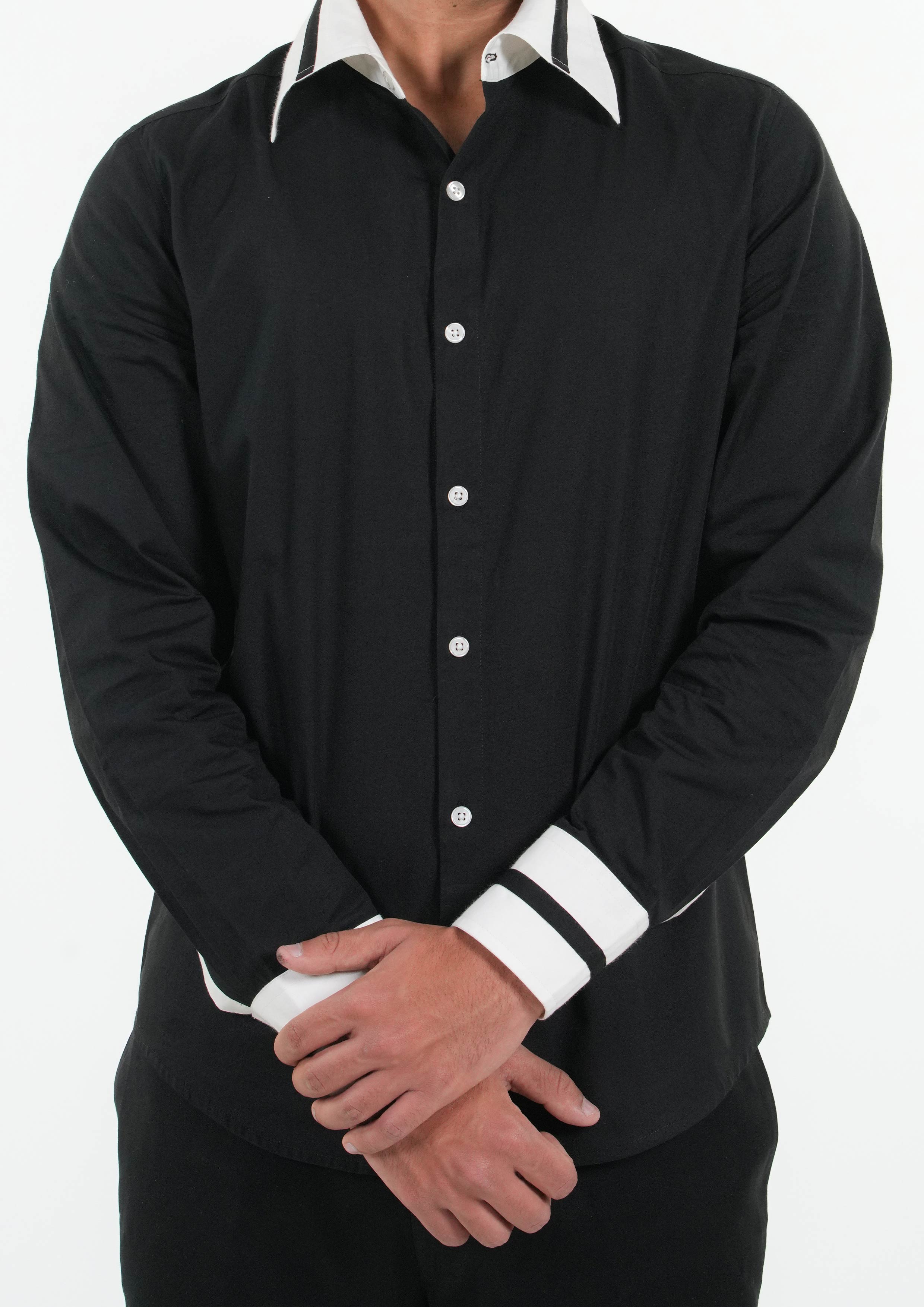 Black shirt with white collar and cuffs on a white background